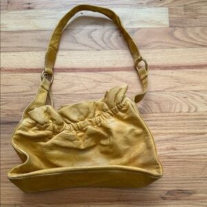 Preowned Yellow/gold Leather Hobo Shoulder bag purse.